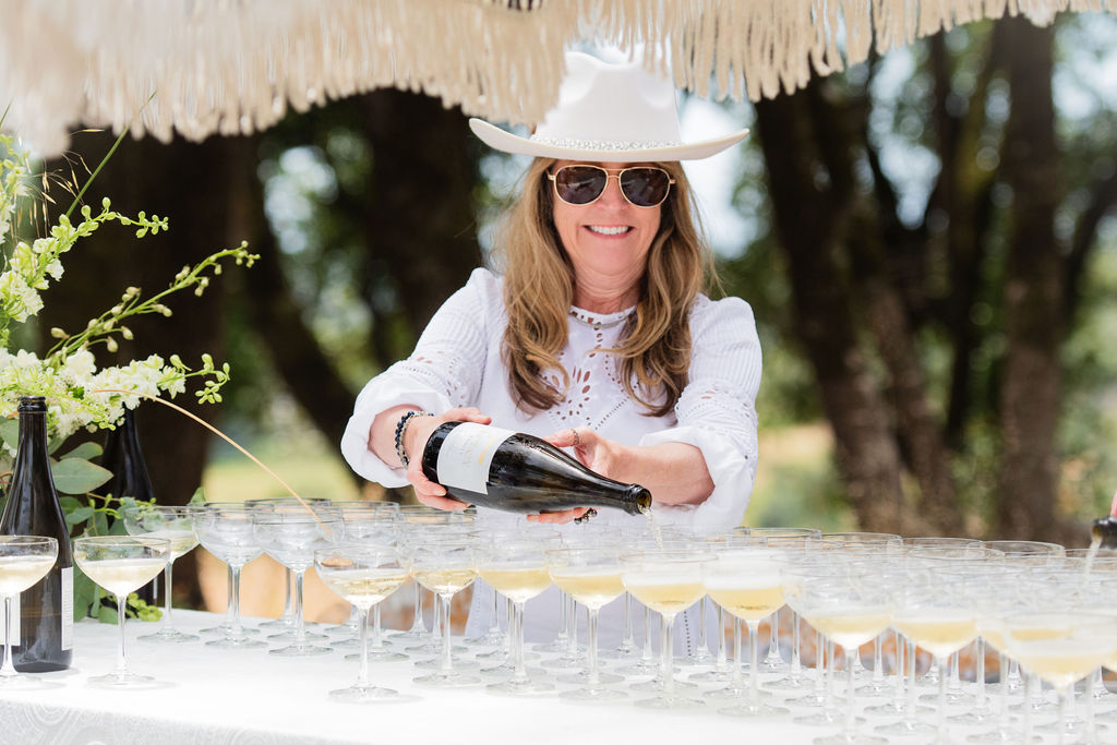 Chalk Hill White Party 2024 - pouring white wine into glasses