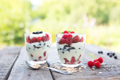 Natural yogurt with fresh raspberries, black currant and muesli.