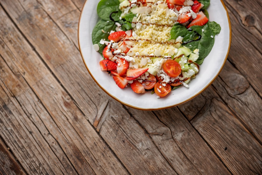 Aerial View of A Healthy Salad On A Old Wooden Table