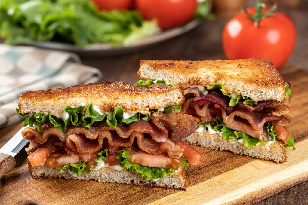 Bacon, lettuce and tomato sandwich cut in half