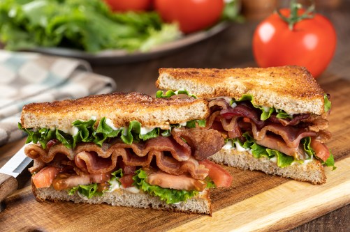 Bacon, lettuce and tomato sandwich cut in half