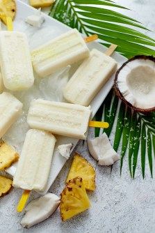 Homemade vegan popsicles made with coconut milk and pineapple. Delicious healthy summer snack